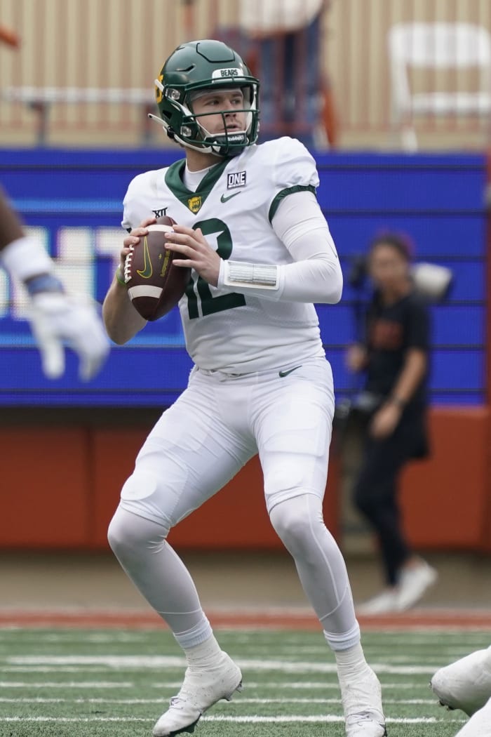 Nov 25, 2022; Austin, Texas, USA; Baylor Bears quarterback Blake Shapen (12) looks throw a pass during the first half against the Texas Longhorns at Darrell K Royal-Texas Memorial Stadium.